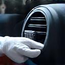 Interior cleaning of a car with vacuum cleaner
